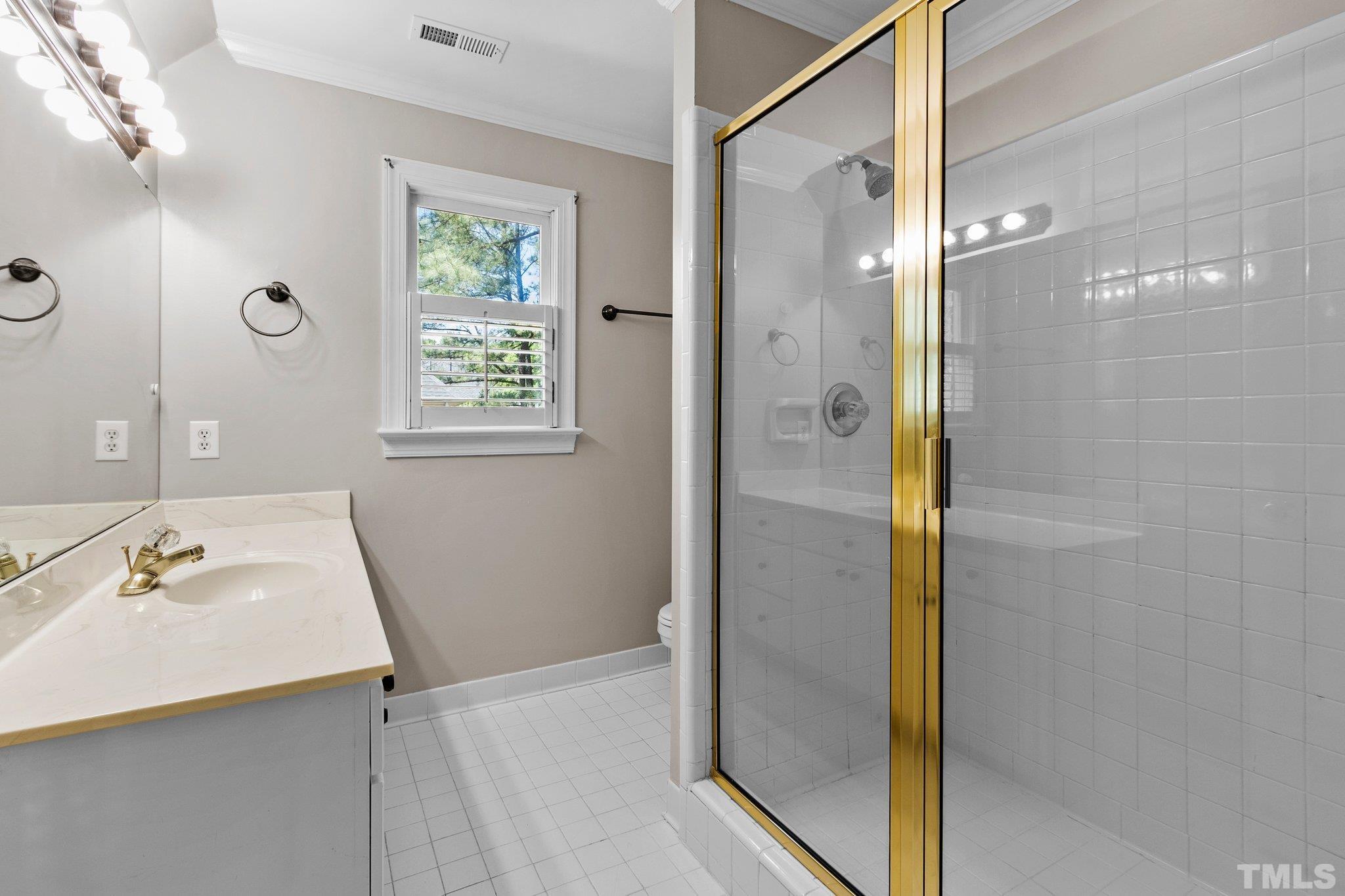 269 Hogans Valley Way Cary, NC 27513 - Photo 27 of 42 a bathroom with a tub a sink and shower