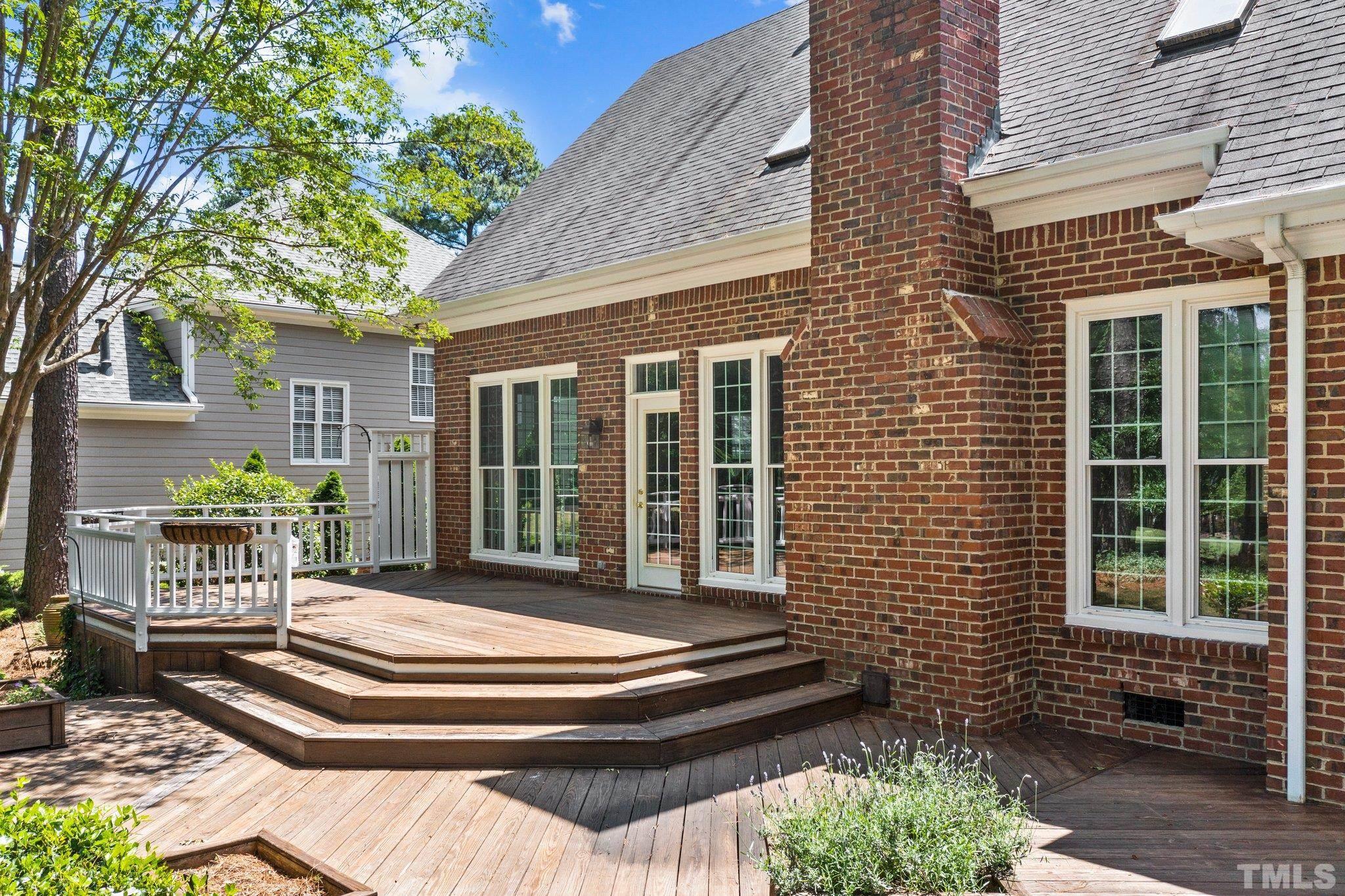 269 Hogans Valley Way Cary, NC 27513 - Photo 32 of 42 a front view of a house with a garden