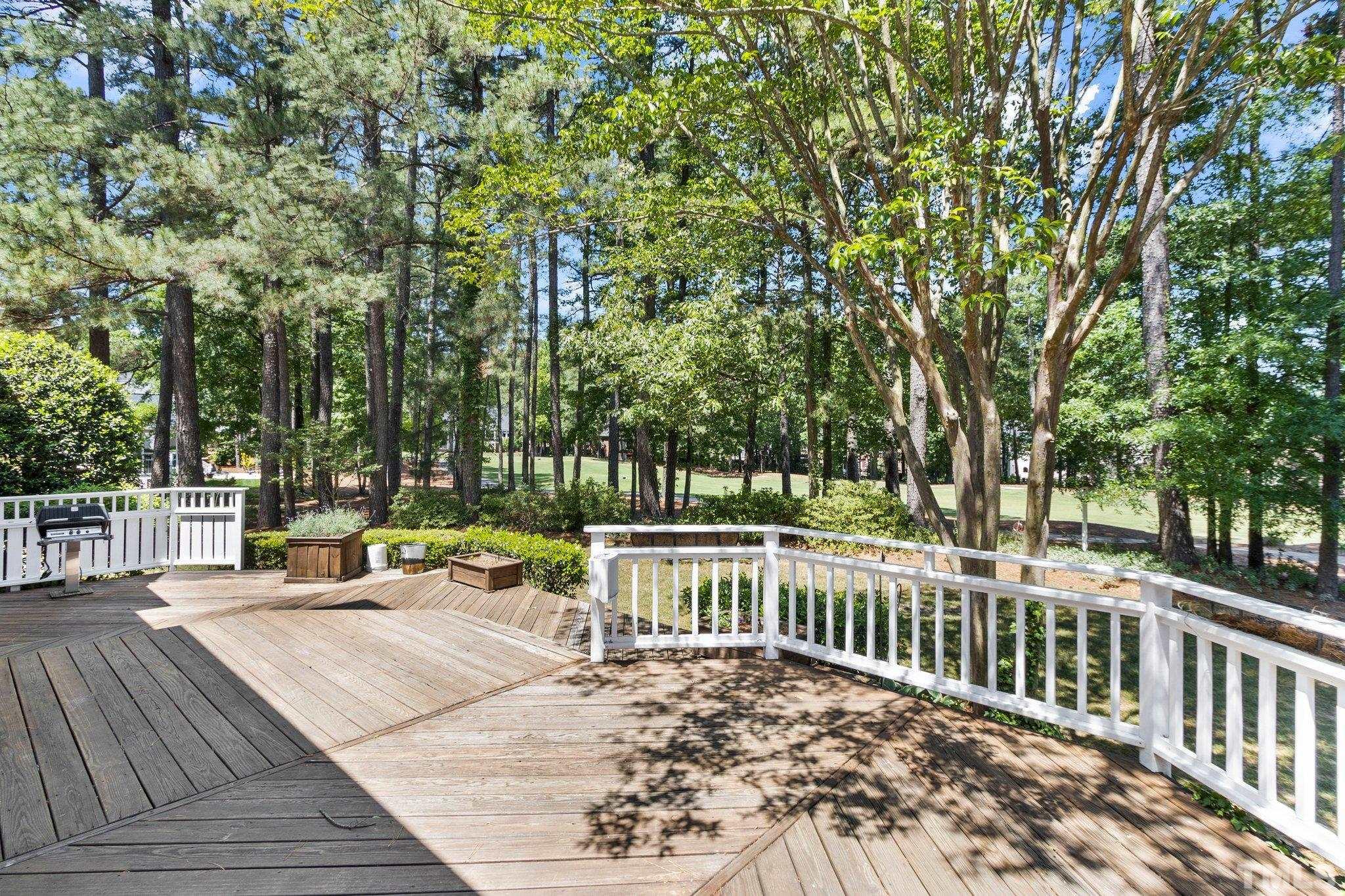269 Hogans Valley Way Cary, NC 27513 - Photo 37 of 42 a view of a deck with chairs and wooden fence