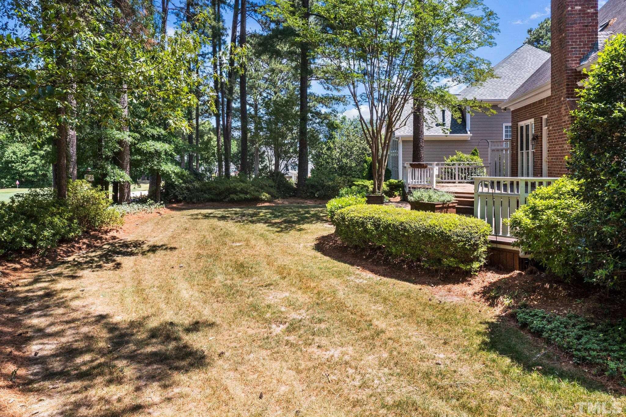 269 Hogans Valley Way Cary, NC 27513 - Photo 39 of 42 a view of backyard of house with green space