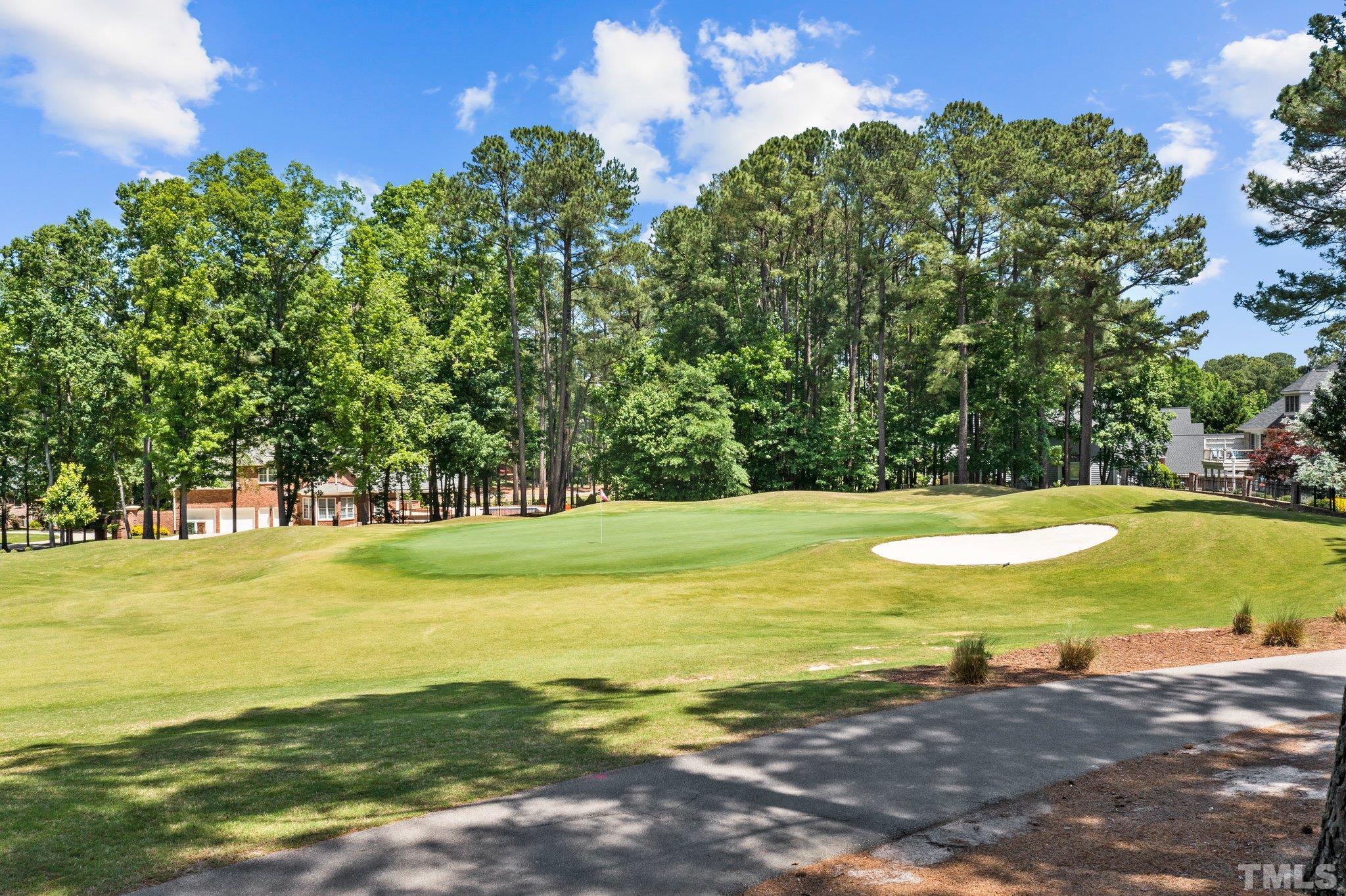 269 Hogans Valley Way Cary, NC 27513 - Photo 40 of 42 a view of an swimming pool with an outdoor space and seating area