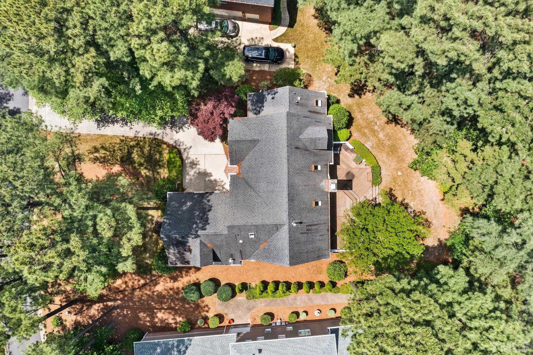 269 Hogans Valley Way Cary, NC 27513 - Photo 42 of 42 an aerial view of a house with a yard and large trees