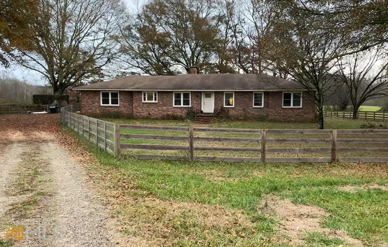189 Etheridge Road Auburn, GA 30011 - Photo 4 of 7 a front view of a house with a yard