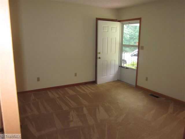 9268 Park Springs Road Ruffin, NC 27326 - Photo 14 of 16 1st Bedroom. BEDROOM ONE LEADS THE DOOR LEADS TO BACK PORCH GREAT TO SCREEN IN AND ENJOY THE SEASONS