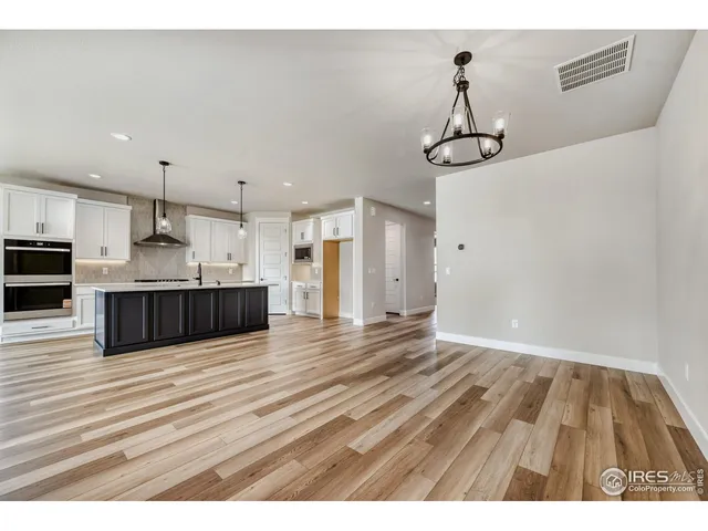 a view interior of a house with kitchen space with wooden floor