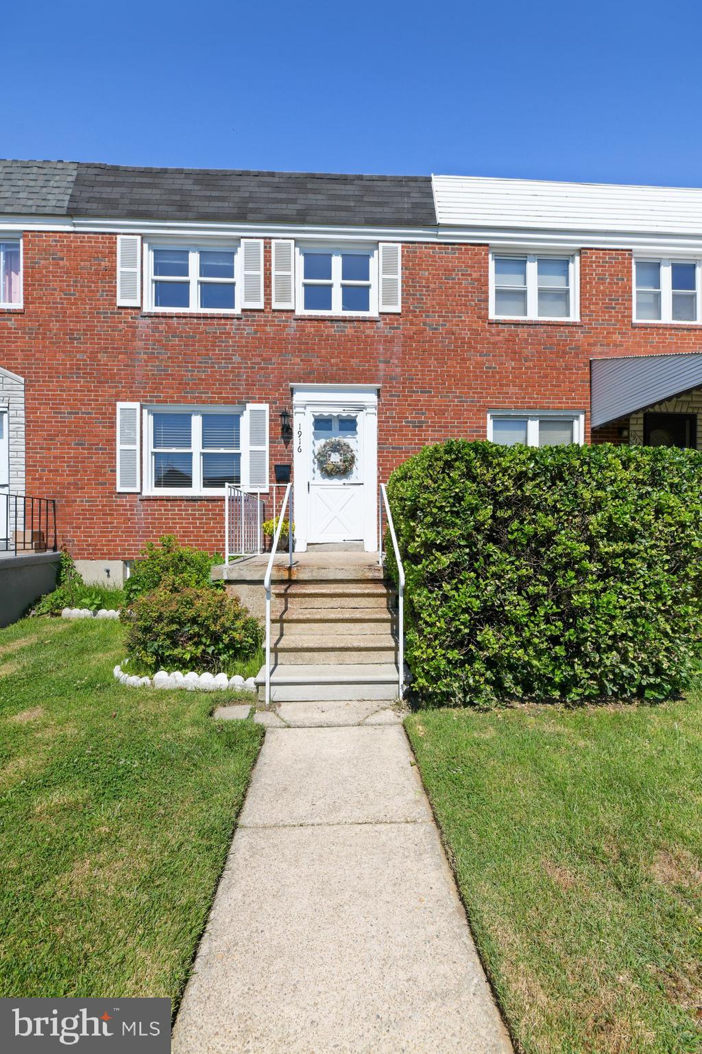1916 Church Road Baltimore, MD 21222 - Photo 34 of 34 a front view of a house with garden