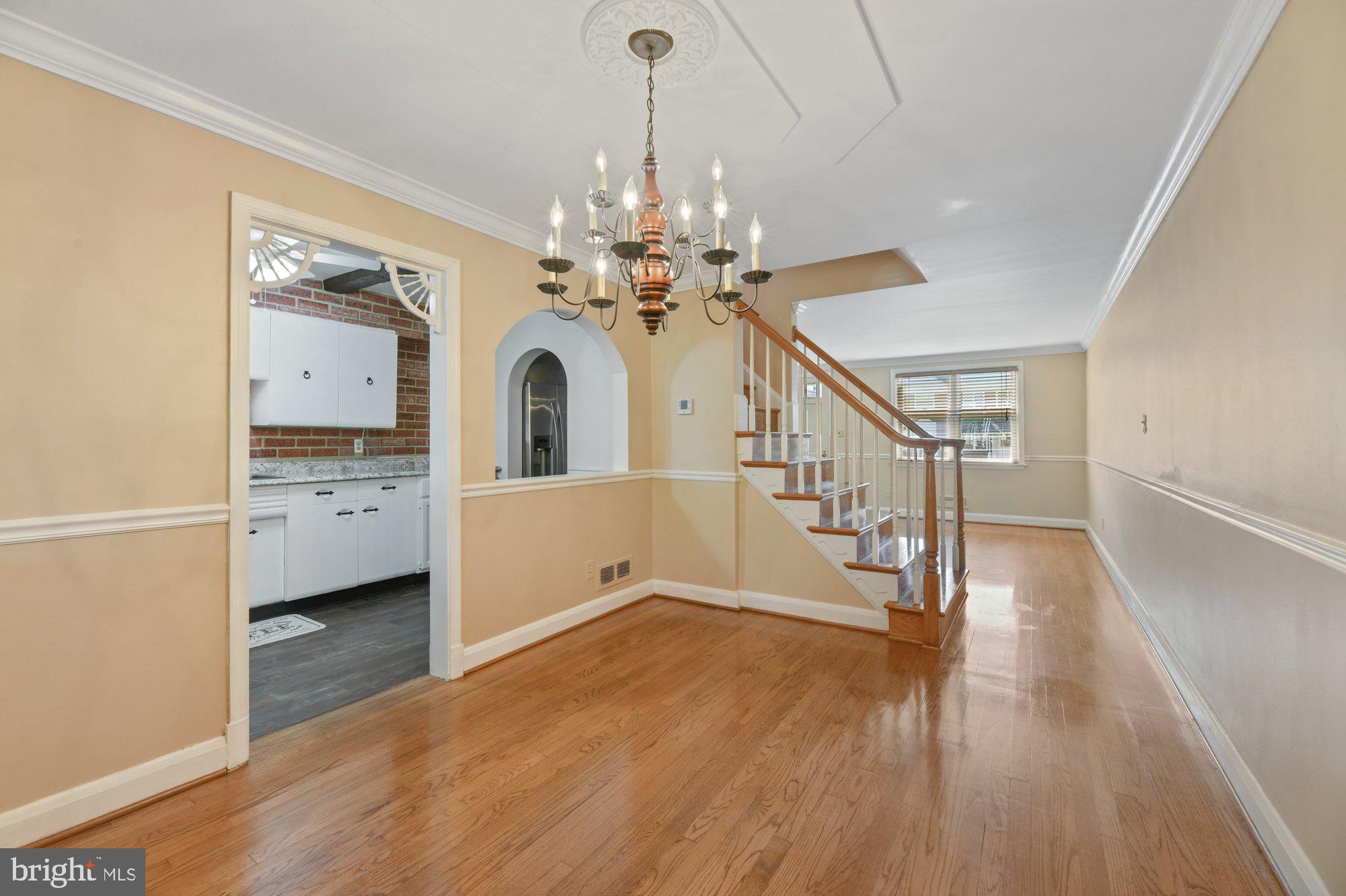 1916 Church Road Baltimore, MD 21222 - Photo 9 of 34 a view of a hallway with a chandelier