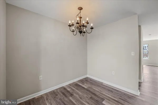 a view of a wooden deck with a yard