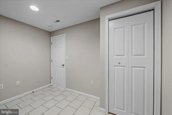 a view of front of house with a yard