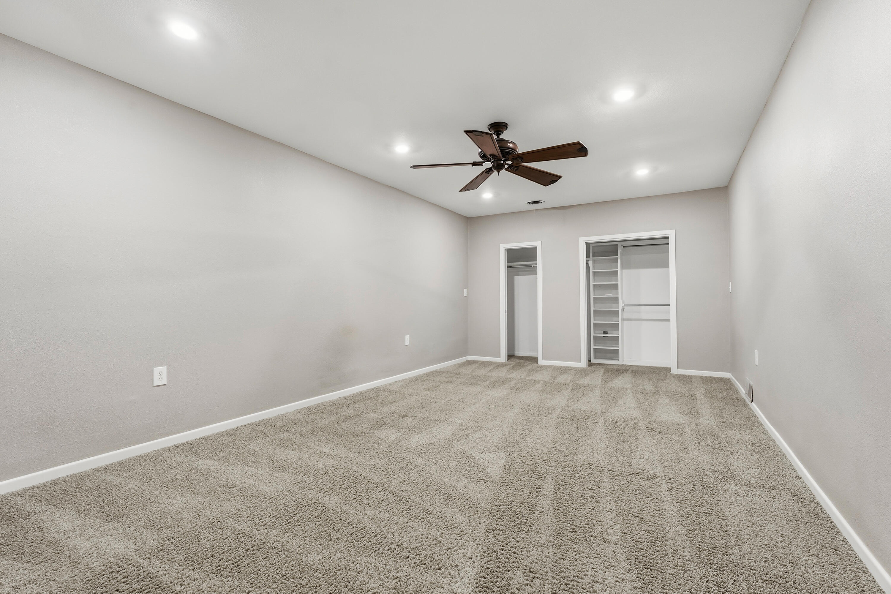 4831 10th Street Lubbock, TX 79416 - Photo 20 of 25 a view of an empty room with a window