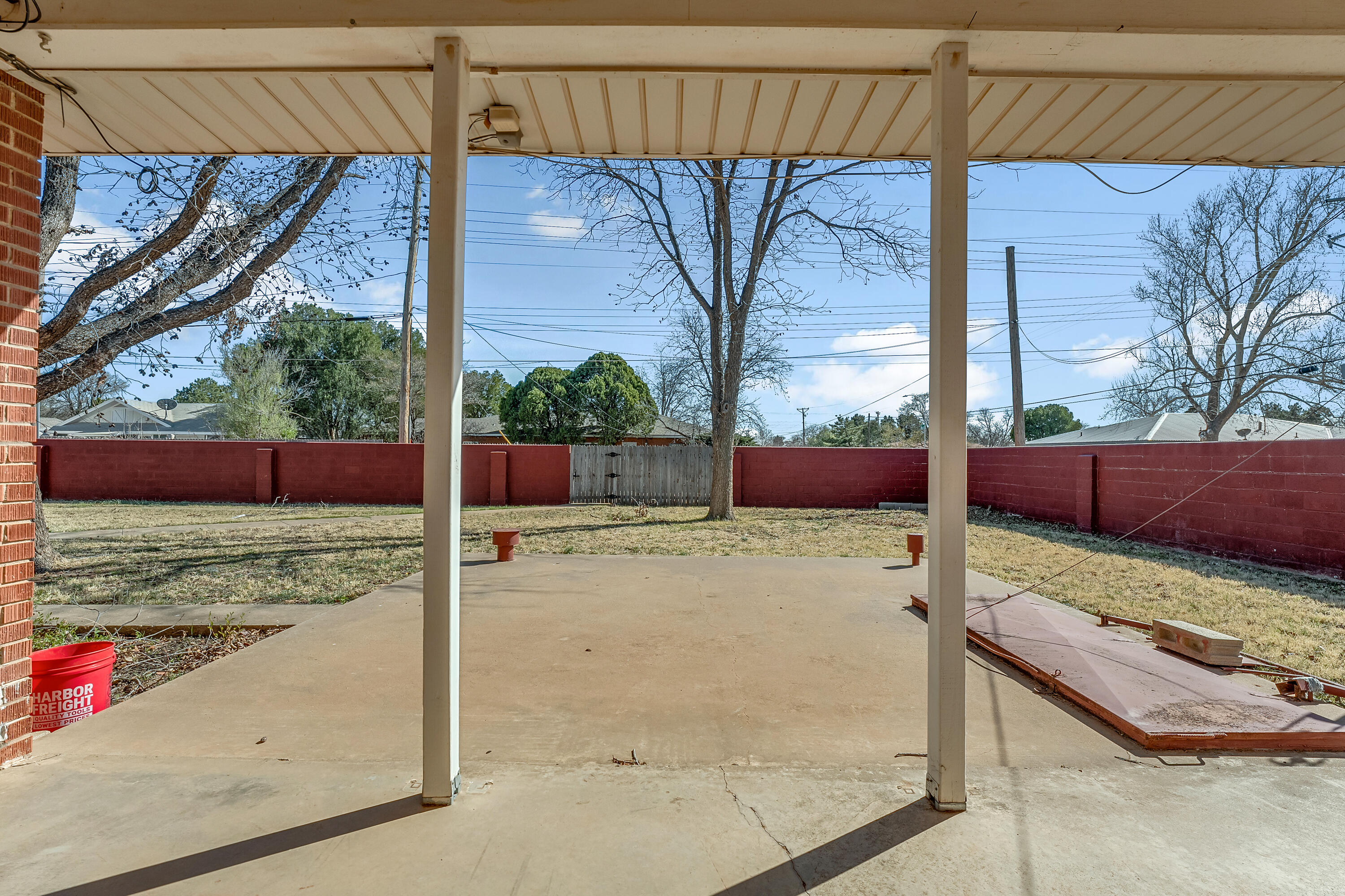 4831 10th Street Lubbock, TX 79416 - Photo 23 of 25 a view of backyard with wooden fence