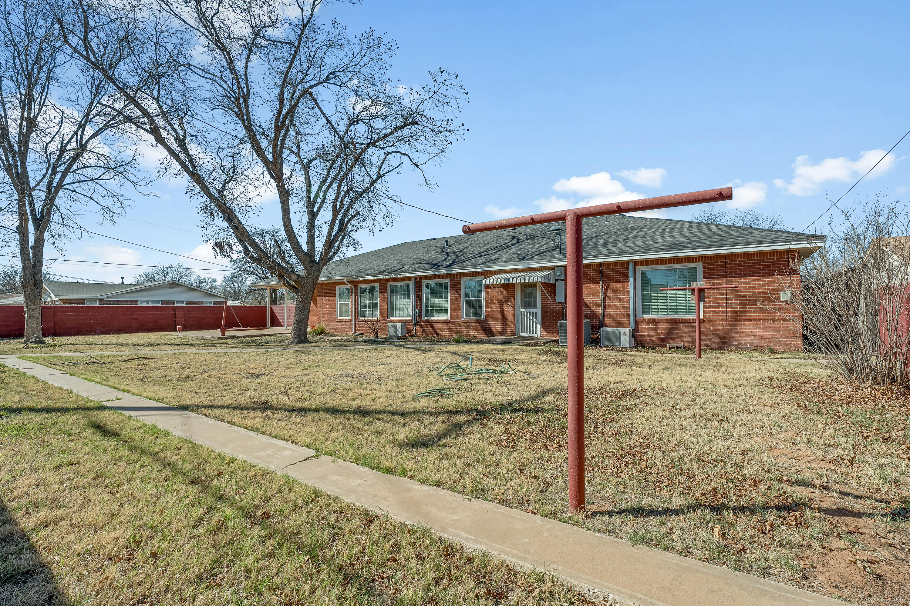 4831 10th Street Lubbock, TX 79416 - Photo 24 of 25 a view of a house with a yard