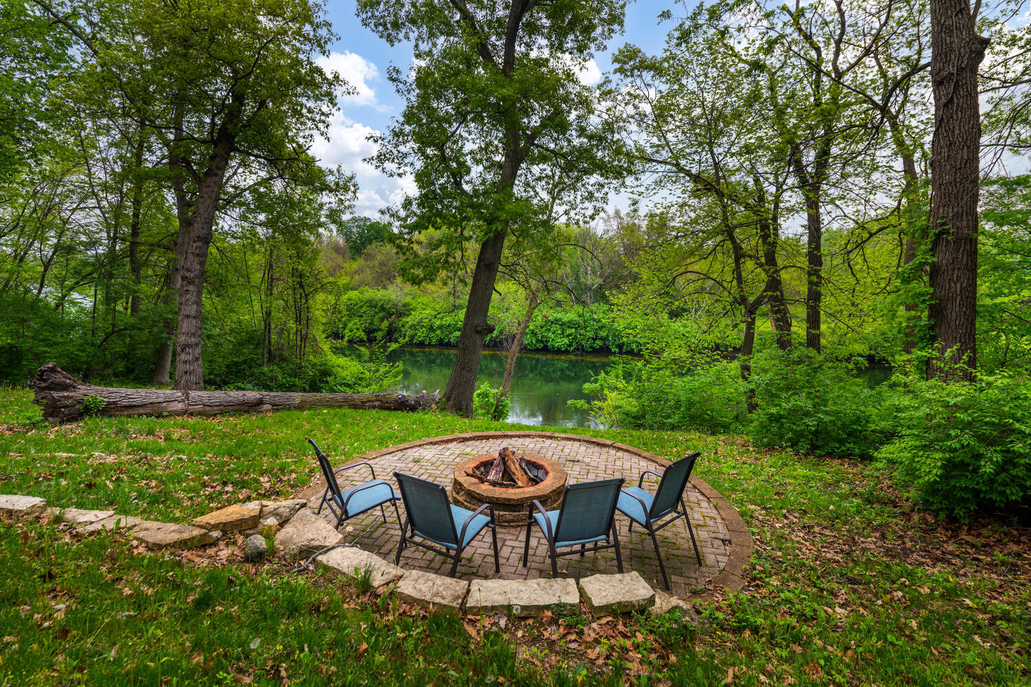 732 South Raven Road Shorewood, IL 60404 - Photo 29 of 48 a view of a backyard with table and chairs under an umbrella