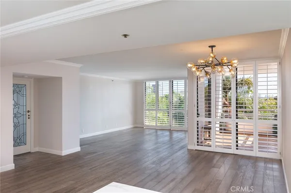 a front view of a building with swimming pool