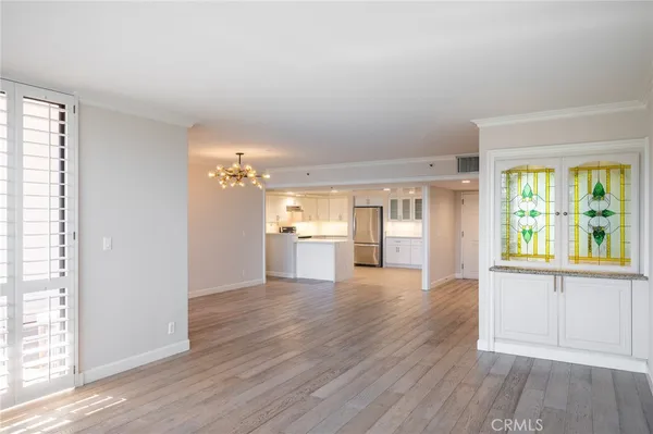 a view of a patio with swimming pool table and chairs