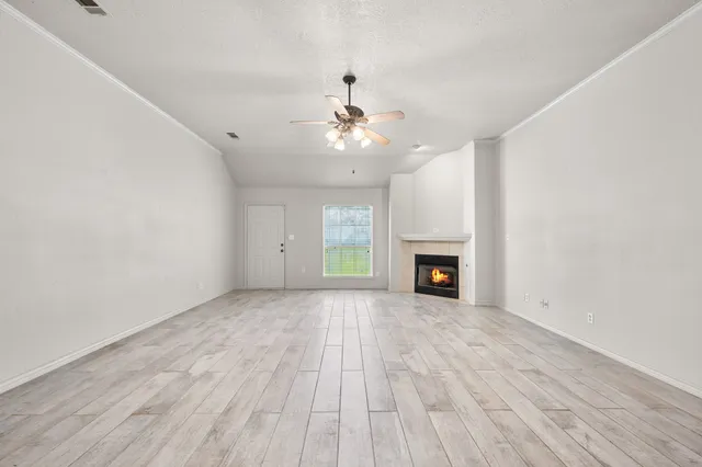 a kitchen with stainless steel appliances granite countertop a sink and a stove