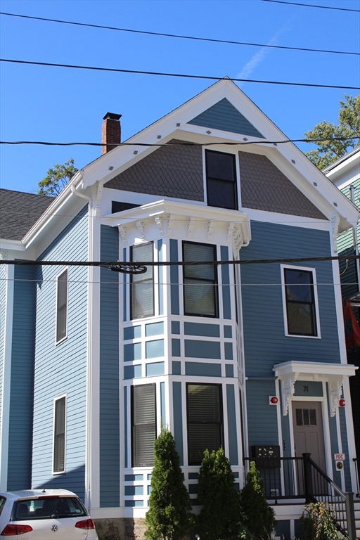 71 Mozart Street, Unit 3 Boston, MA 02130 - Photo 1 of 26 a front view of a house