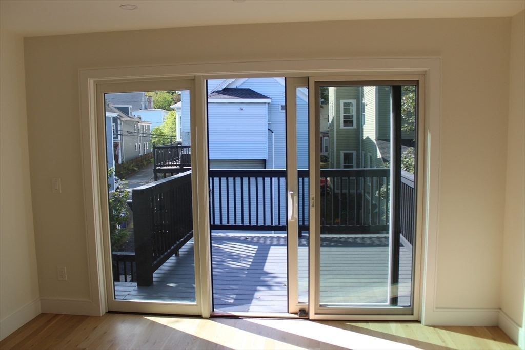 71 Mozart Street, Unit 3 Boston, MA 02130 - Photo 13 of 26 a view of a entryway door