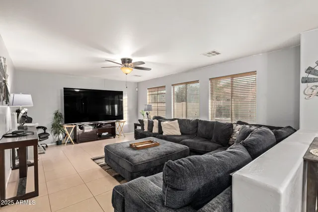 a kitchen with a refrigerator and a sink