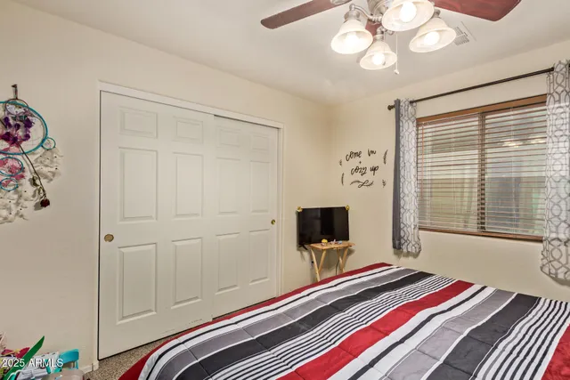 a bathroom with a sink a mirror and a shower