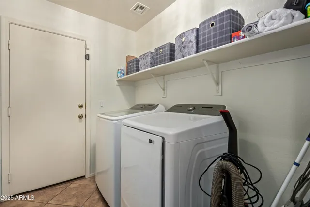 a view of a swimming pool with an outdoor space and seating area