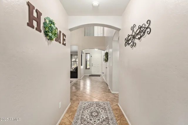 a view of a hallway with entryway
