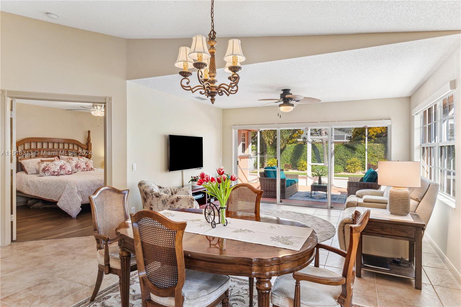 256 Brier Circle Jupiter, FL 33458 - Photo 17 of 50 a view of a dining room with furniture window and outside view