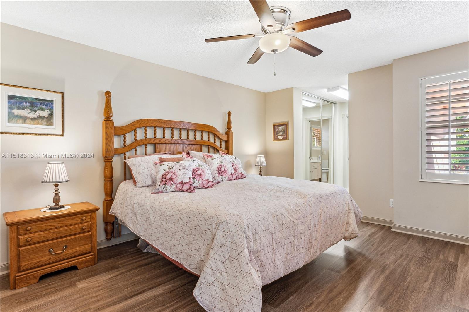 256 Brier Circle Jupiter, FL 33458 - Photo 22 of 50 a bedroom with a bed and a window