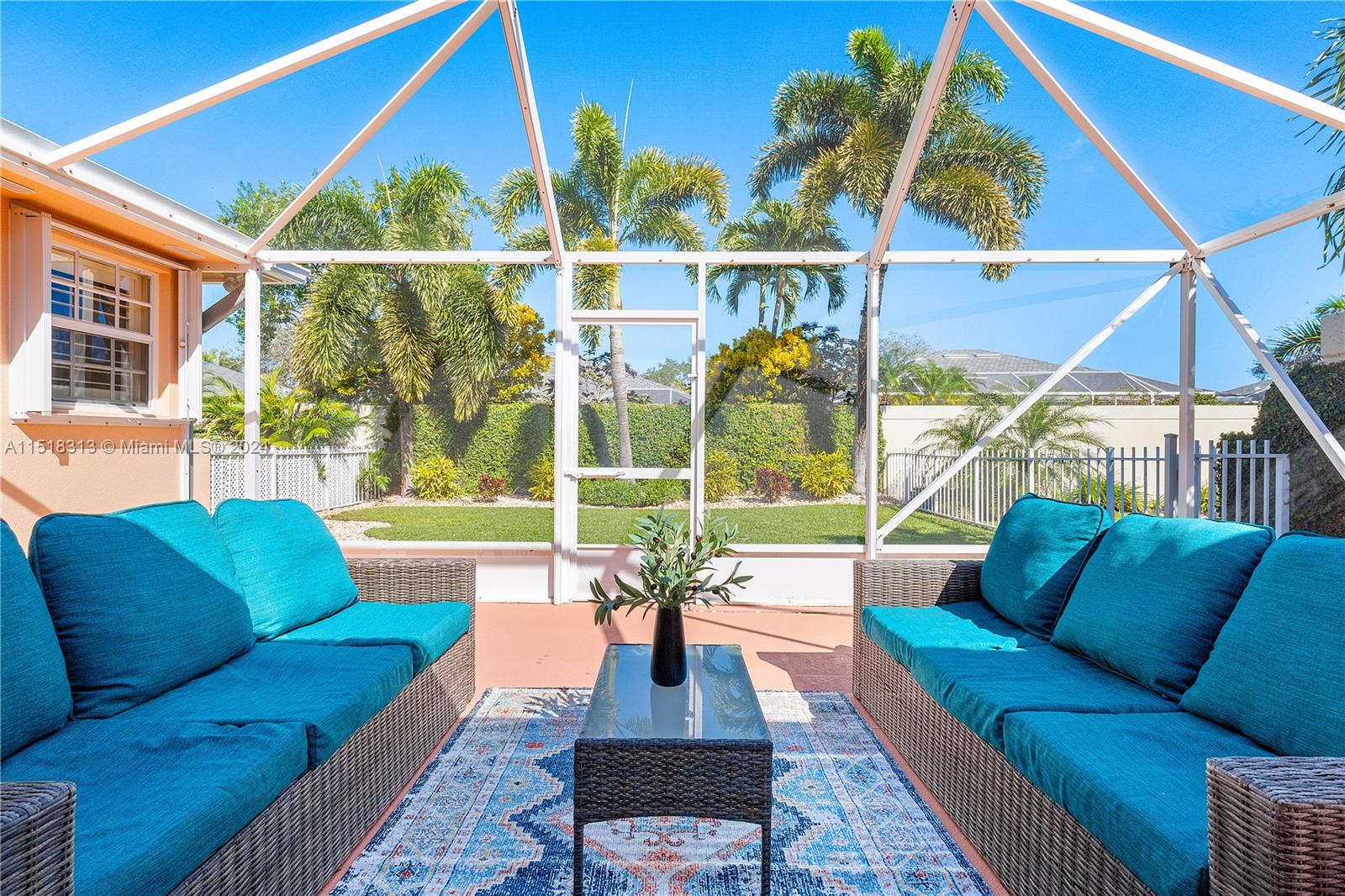 256 Brier Circle Jupiter, FL 33458 - Photo 29 of 50 a living room with furniture and a large window