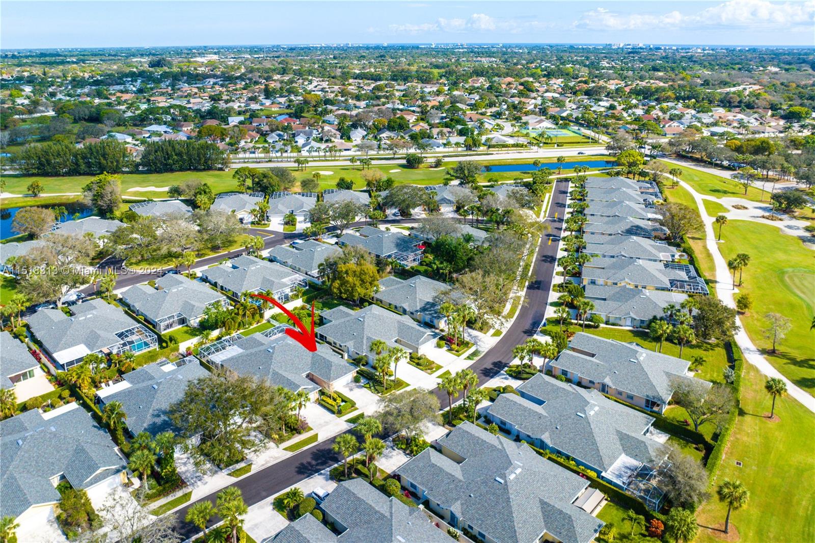 256 Brier Circle Jupiter, FL 33458 - Photo 41 of 50 an aerial view of residential houses with outdoor space