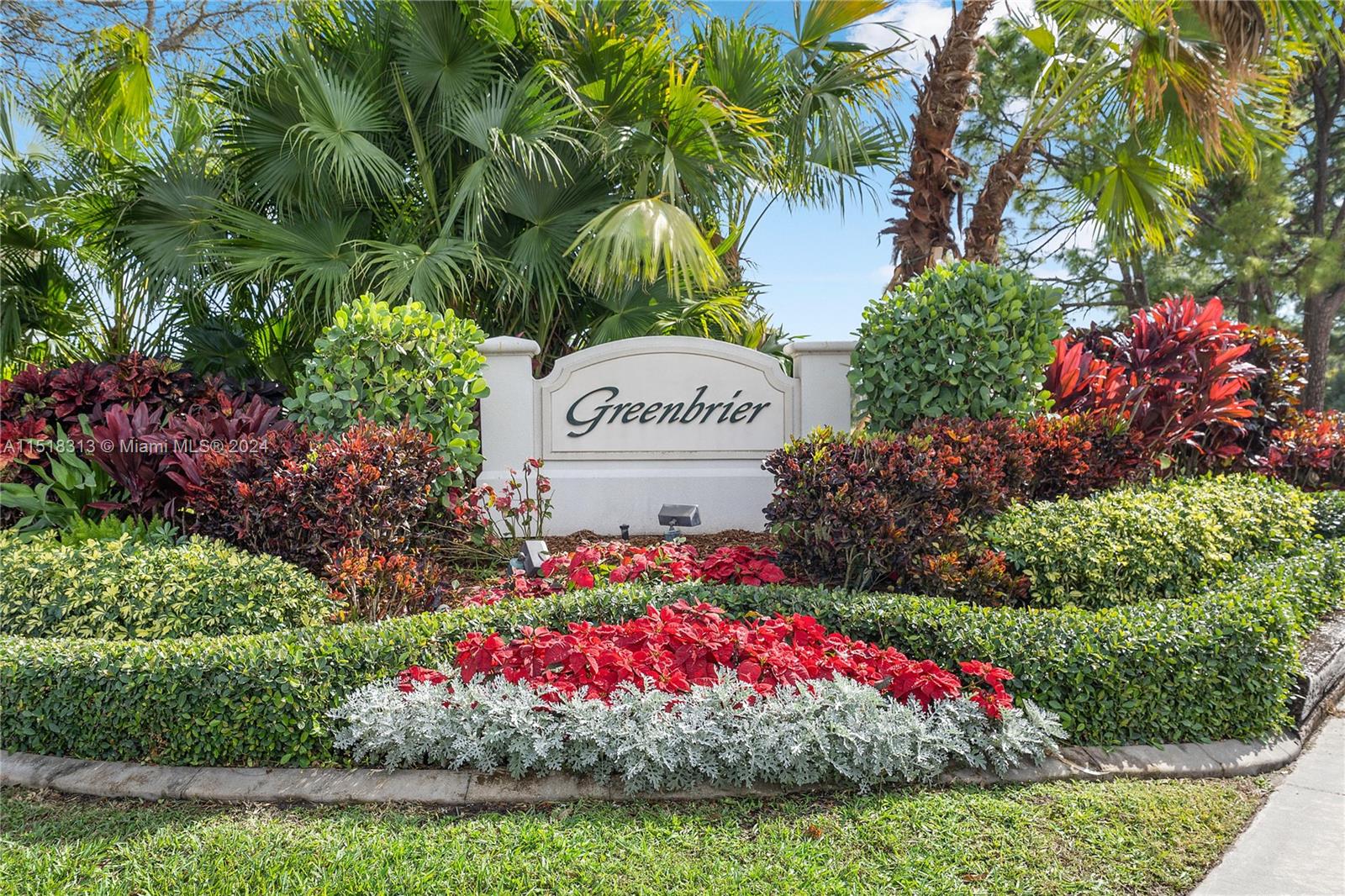 256 Brier Circle Jupiter, FL 33458 - Photo 49 of 50 a sign that is sitting in front of flowers