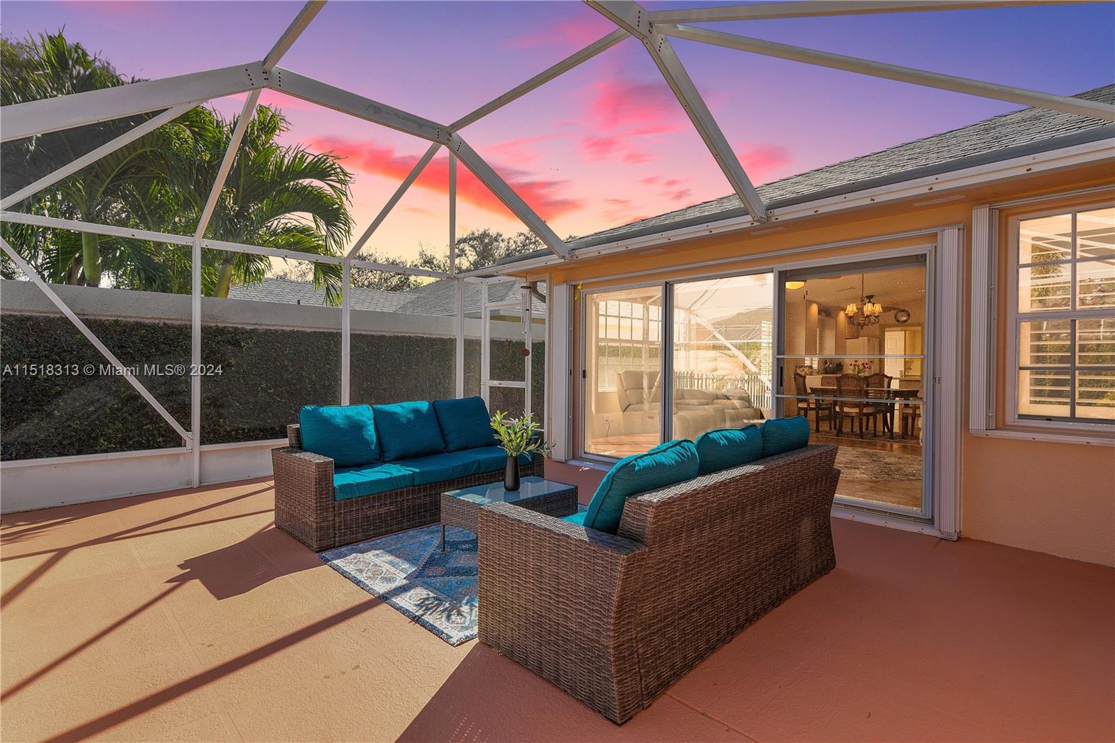 256 Brier Circle Jupiter, FL 33458 - Photo 6 of 50 a outdoor living space with furniture and garden view