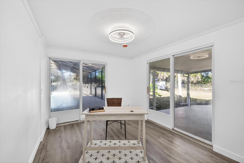 4928 Amherst Court New Port Richey, FL 34652 - Photo 11 of 50 a workspace with wooden floor