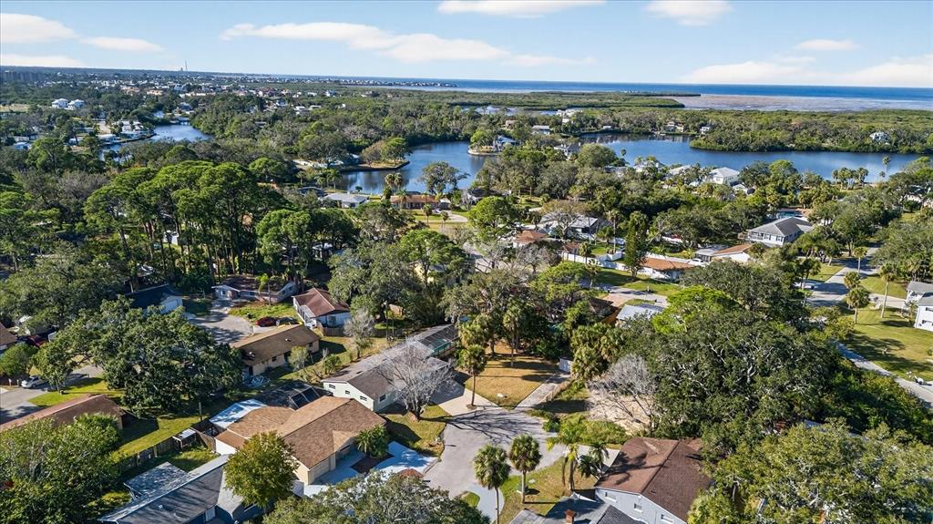 4928 Amherst Court New Port Richey, FL 34652 - Photo 26 of 50 an aerial view of a city with lots of residential buildings