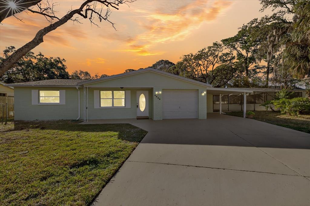 4928 Amherst Court New Port Richey, FL 34652 - Photo 29 of 50 a view of a house with a yard