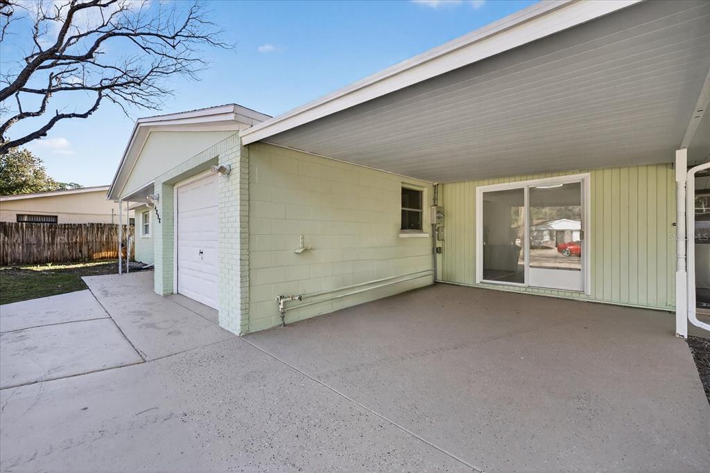 4928 Amherst Court New Port Richey, FL 34652 - Photo 31 of 50 a view of a house with a garage