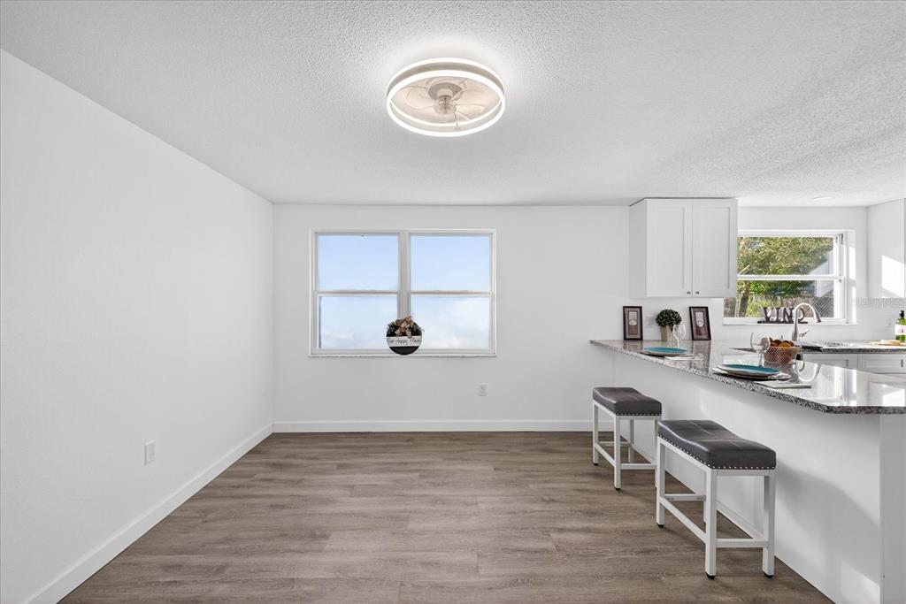 4928 Amherst Court New Port Richey, FL 34652 - Photo 34 of 50 a view of a livingroom with furniture and a window