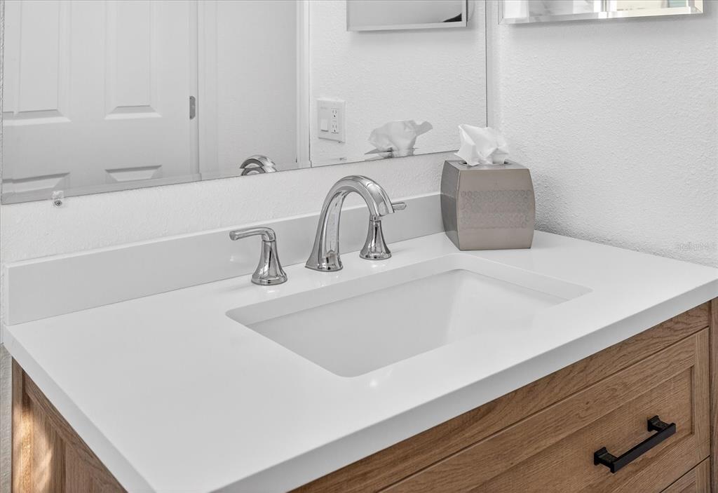 4928 Amherst Court New Port Richey, FL 34652 - Photo 41 of 50 a bathroom with a sink and a bathtub