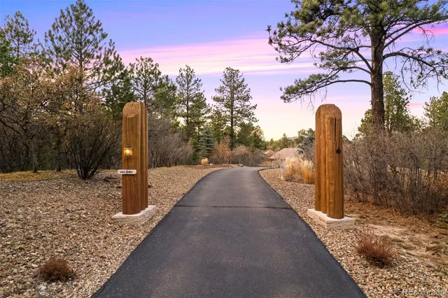a view of a pathway with a trees