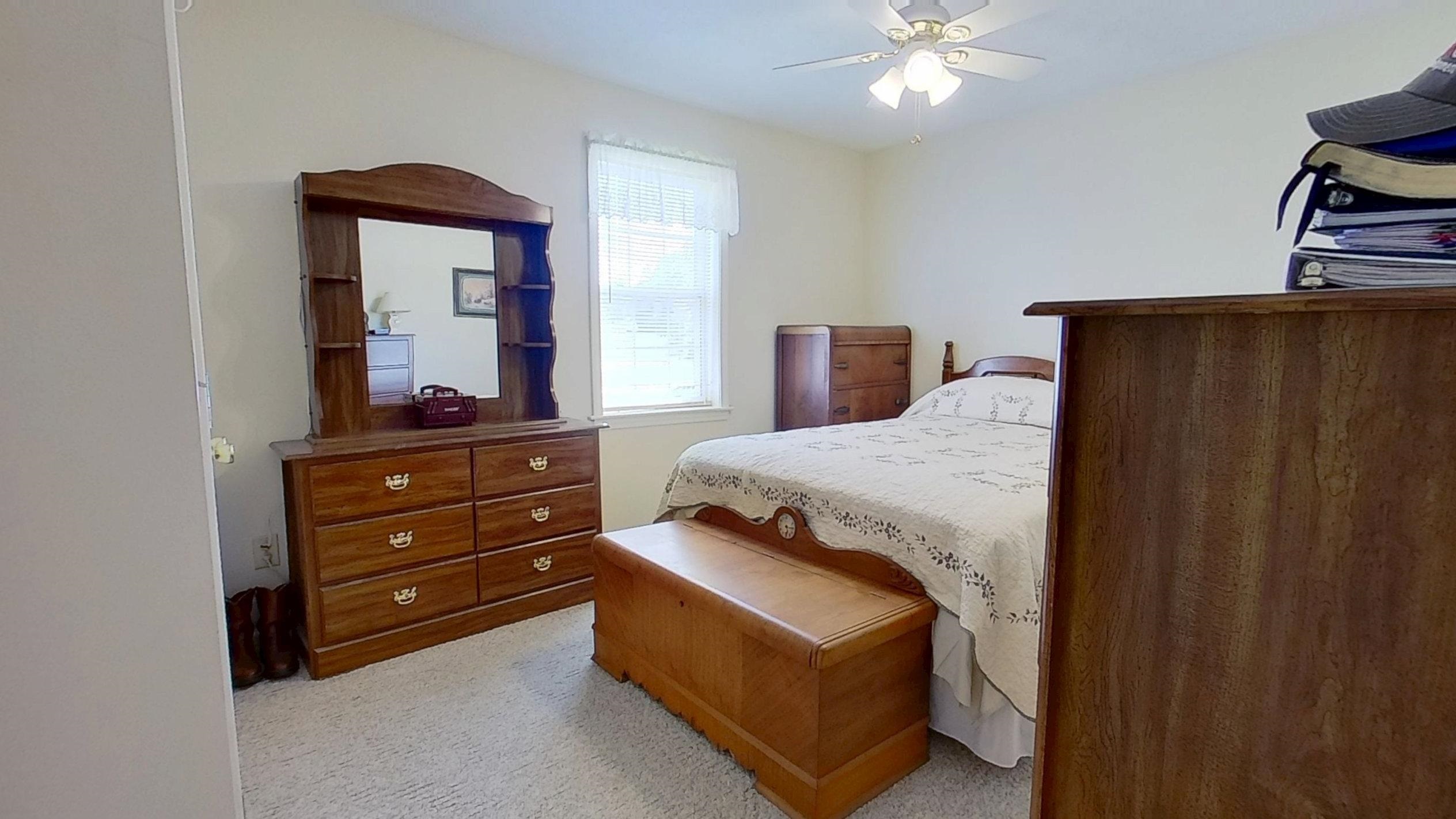 30 Rodeo Way Savannah, TN 38372 - Photo 12 of 29 Bedroom with light carpet and ceiling fan