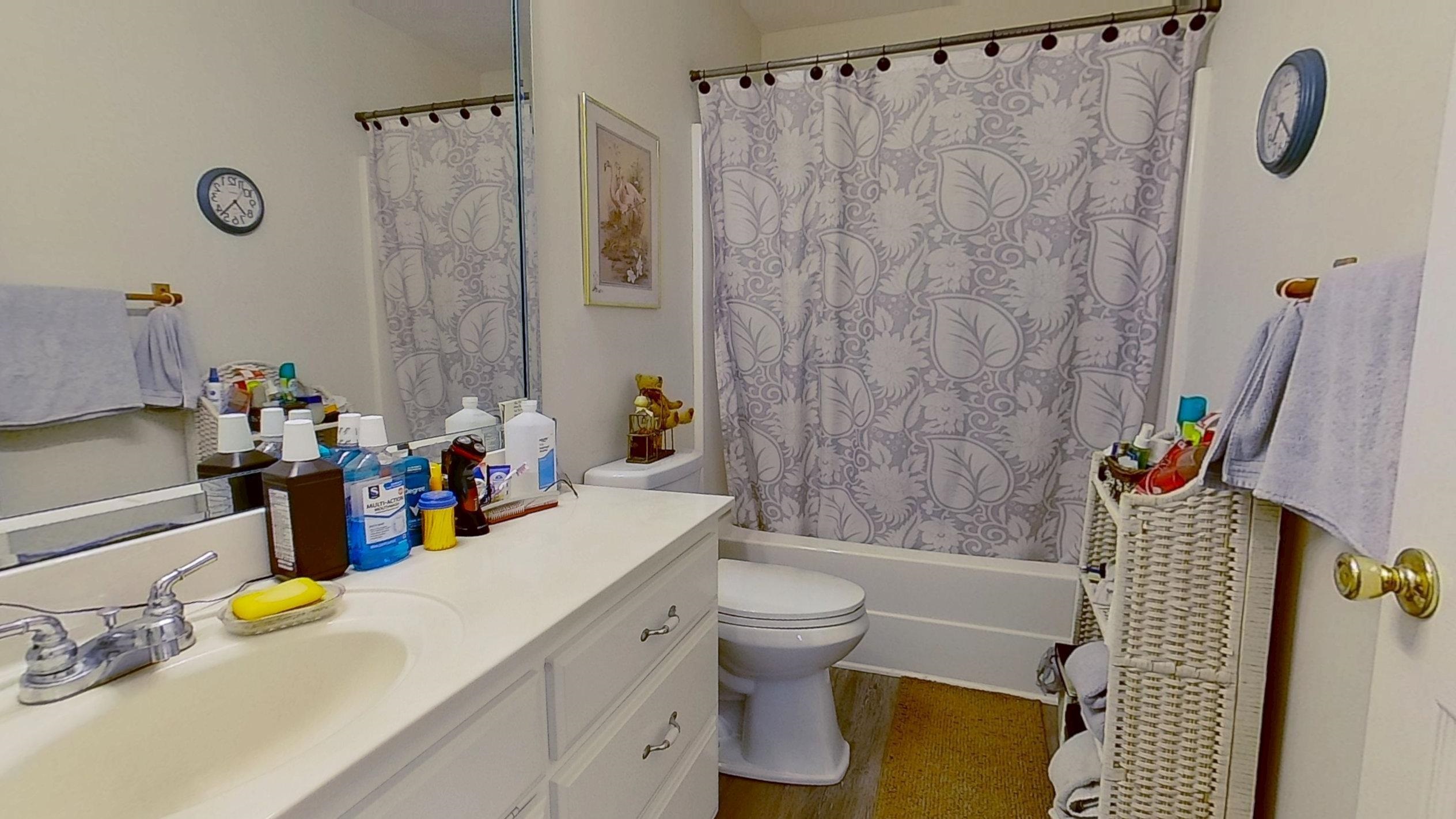 30 Rodeo Way Savannah, TN 38372 - Photo 16 of 29 Full bath with shower / tub combo, vanity, and dark wood finished floors