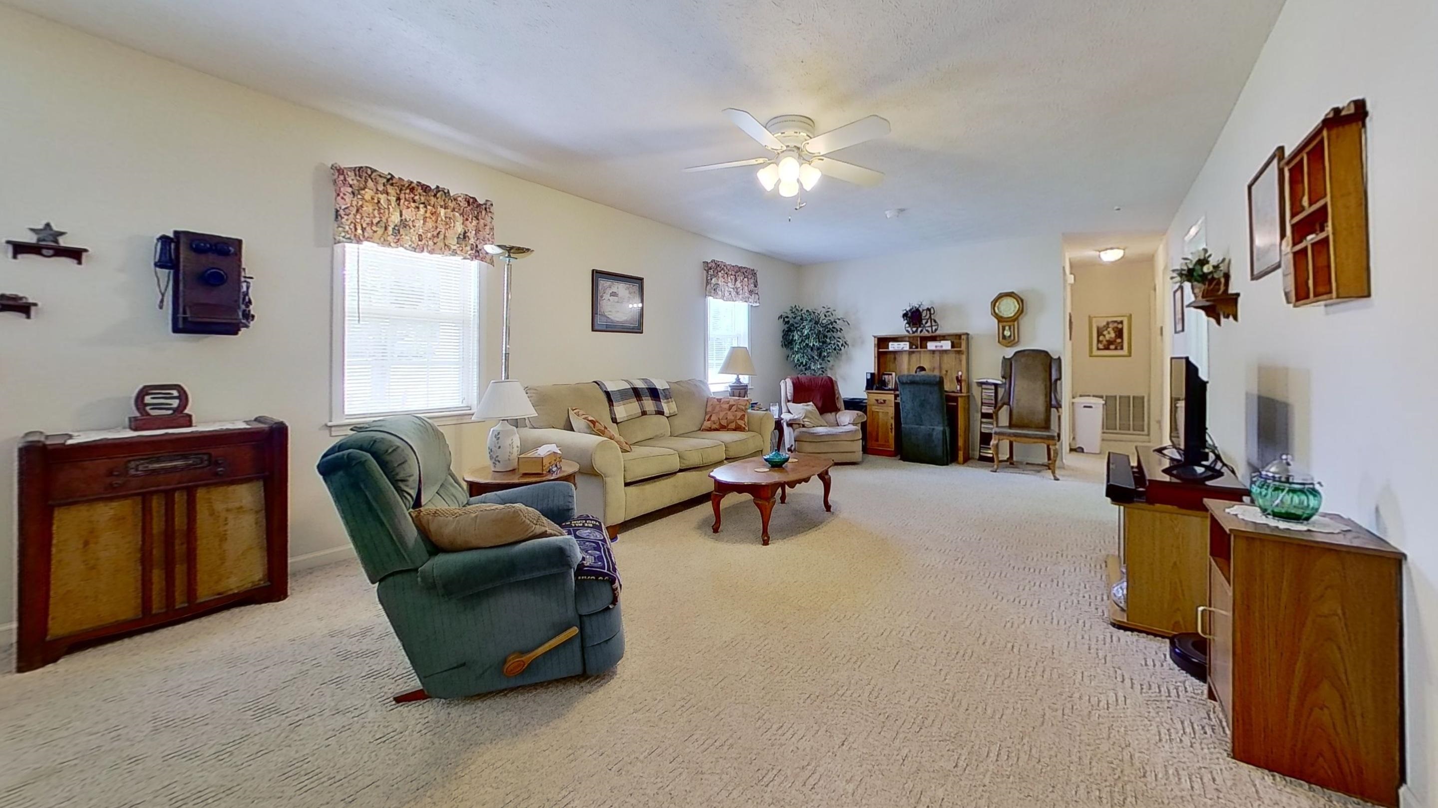 30 Rodeo Way Savannah, TN 38372 - Photo 2 of 29 Living room featuring light colored carpet and ceiling fan