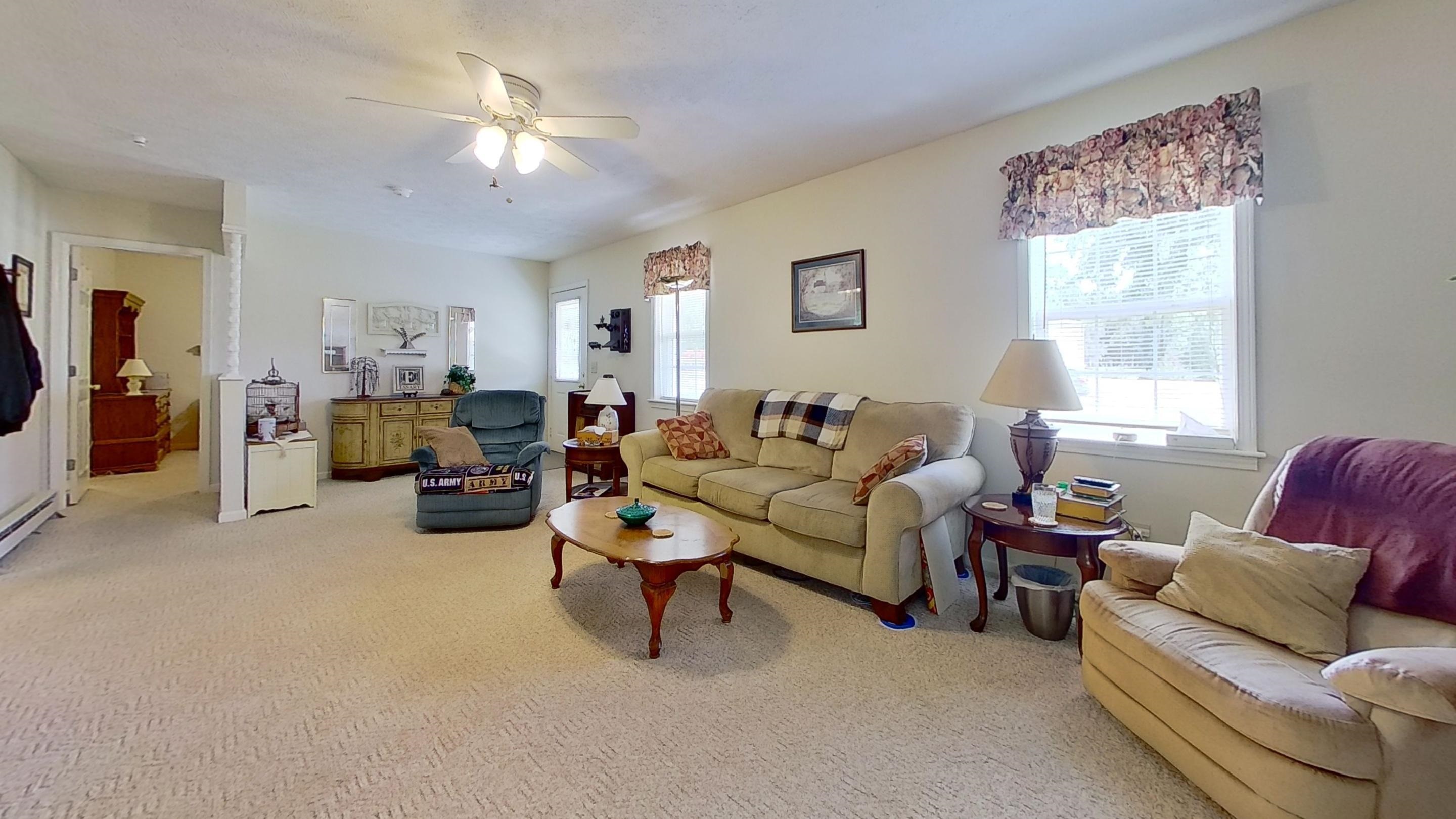 30 Rodeo Way Savannah, TN 38372 - Photo 3 of 29 Living room featuring light colored carpet and ceiling fan