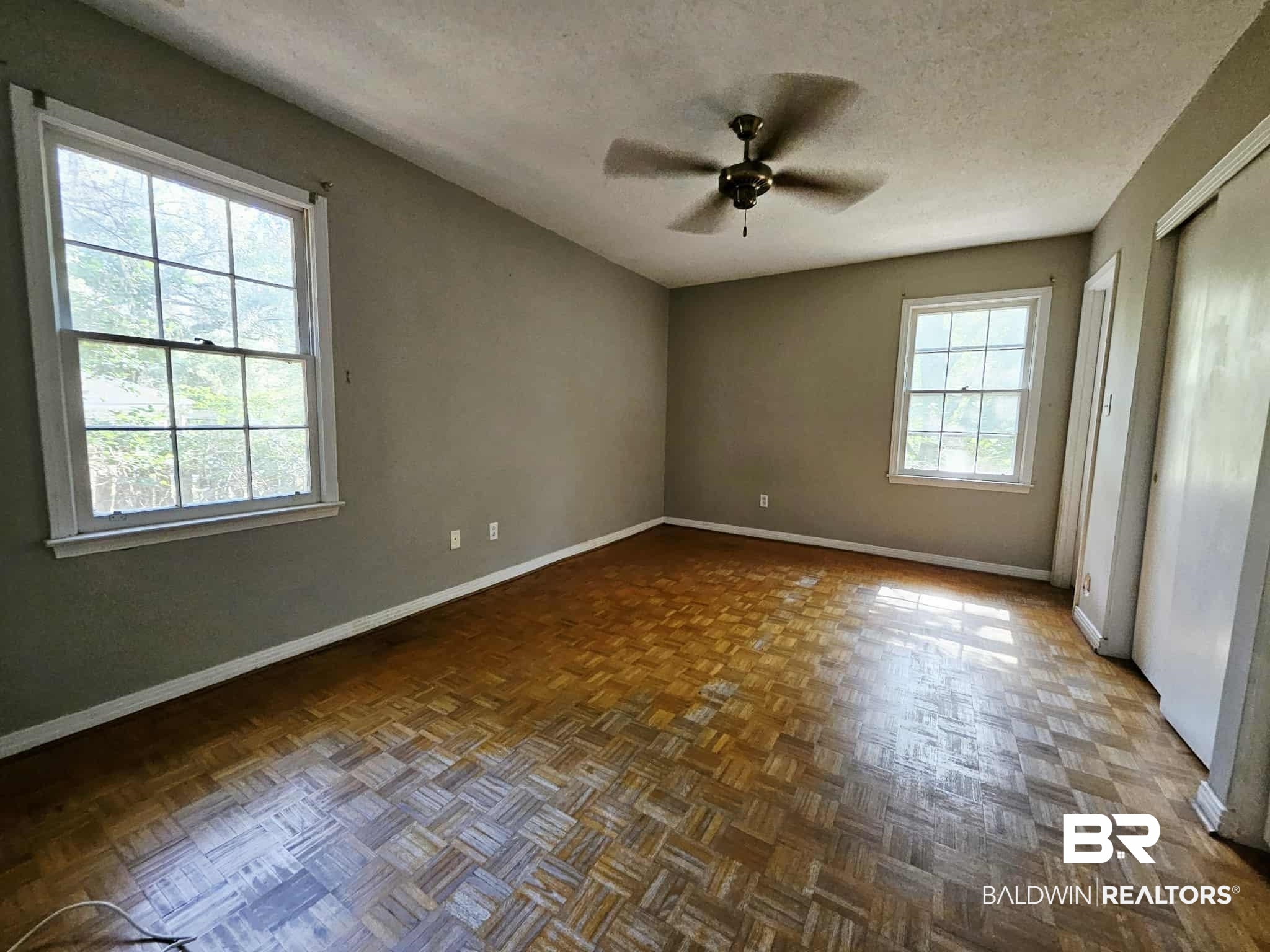 324 Vanderbilt Drive Mobile, AL 36608 - Photo 9 of 17 Spare room with a textured ceiling and a ceiling fan