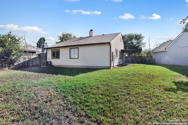 a view of a backyard with a garden