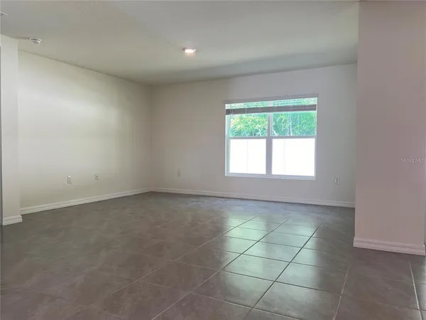 an empty room with a window