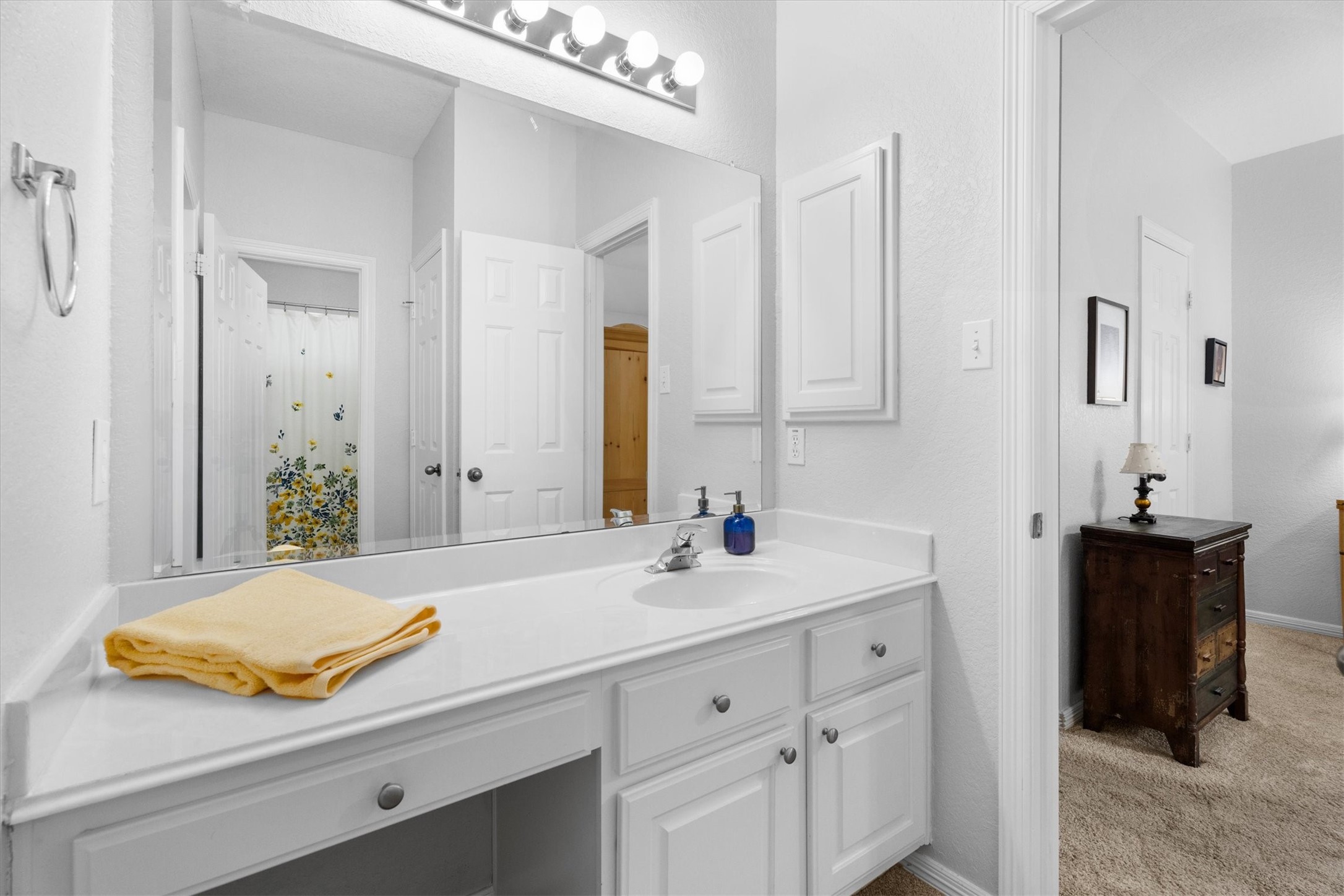 9406 Lochflora Drive Spring, TX 77379 - Photo 23 of 49 a bathroom with a sink and a mirror