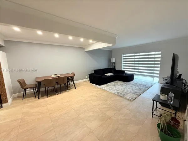 a bedroom with furniture and a bed