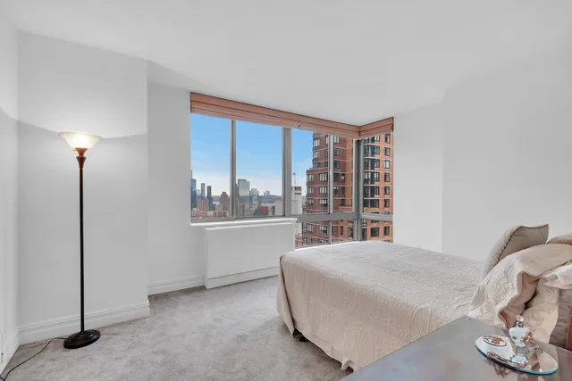 a bathroom with a double vanity sink mirror double shower and a bathtub