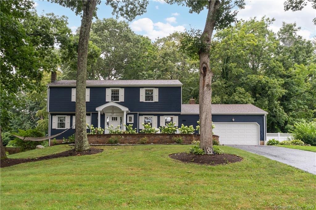 78 Horseshoe Road Guilford, CT 06437 - Photo 1 of 1 a front view of a house with a yard and green space